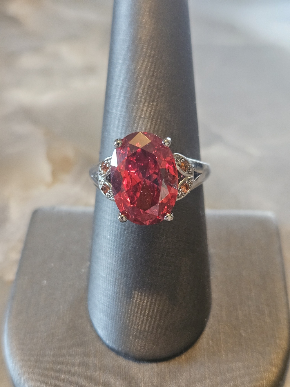 Silver Tone Ring with Oval Orange Gemstone